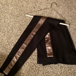 Black slacks with stripe